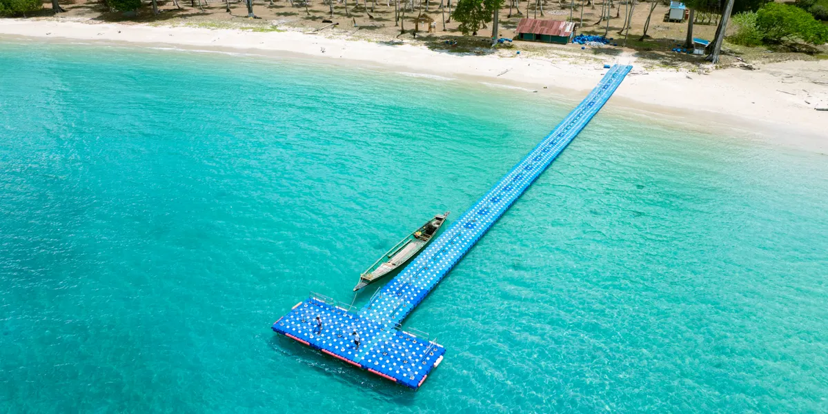 A floating jetty over turquoise water in the Andaman Islands